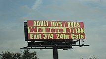 I think I may have seen a billboard like this along Interstate 75 in Sumter County, Florida. Then again, it could've been for a different strip club at a different exit.