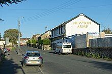 Image looking east up Westburn Road to Local Pub as of late 2018 with small amenities shop