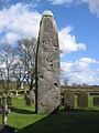 Image 12The Rudston Monolith, almost 26ft high, close to Rudston Parish Church of all Saints (from History of Yorkshire)