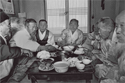 Men eating in a sarangbang in Imsil County (1986)