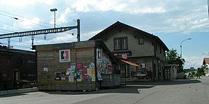 Two-story building with gabled roof