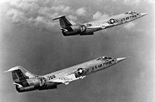 Two F-104s flying in formation