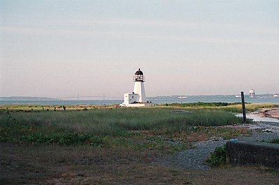 The Prudence Island Lighthouse (known locally as the Sandy Point Lighthouse) is located on Sandy Point, Prudence Island, Rhode Island and is the oldest lighthouse tower in the state. Sandy Point is nicknamed Chibacoweda, meaning "little place separated by a passage," because the location is a little more than one mile offshore.