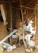 Weaving bogolan in Mali. Note toggle treadles.