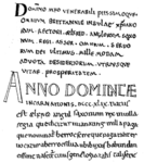 A white page with black handwritten insular script: it begins with an enlarged initial 'D' (in "Domino meo venerabili..."), and half-way down the page it is interrupted by a large "Anno Domincæ", in outline script.