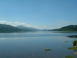 A large lake surrounded by hills