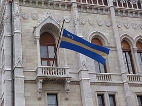 Székely flag on the Hungarian Parliament Building, Budapest, Hungary