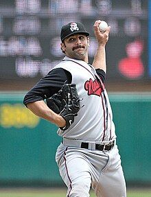 A baseball player in gray