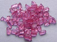 Small translucent, pink-coloured crystals a bit like the colour of candy floss