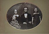 Obed Dickinson with his wife and children.