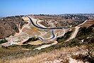 Mexico-United States barrier in Smuggler's Gulch, as seen from the northwest, in 2009