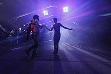 Photo of two people dancing at baile sonidero in Martín Carrera, Mexico City.