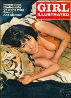 A scantily dressed young woman lying on a tiger skin.