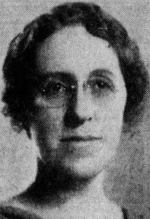 Kathleen Moore Knight, from a 1937 newspaper; a white woman with wavy dark hair, wearing eyeglasses