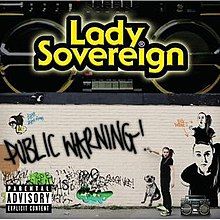 The cover shows a boombox with the artist's name in front of it, colored in yellow. Below it is a beige brick wall filled with graffiti and images of the artist. The artist herself appears to spray paint the album's title in black on the wall.