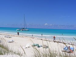 Playa Pilar with the catamaran Ocean Voyager moored off the beach