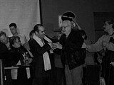 Paul Ferreira receiving congratulations from former NDP leader Donald C. Macdonald on Election Night.