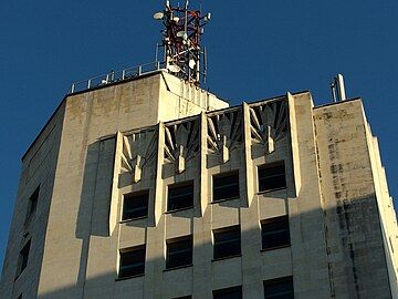 Mature - Detail of the Telephones Company Building (Calea Victoriei no. 37), Bucharest, by Walter Froy, Louis S. Weeks and Edmond van Saanen Algi, 1929-1934[81]