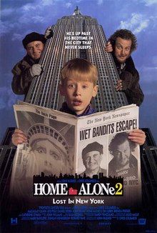 Kevin McCallister holding a newspaper that has the Statue of Liberty doing Kevin's iconic scream and the news of the Wet Bandits' escape, with an enlarged Marv and Harry in the background peeking from behind the Empire State Building.