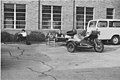 Left to right on the couch: Eric Bussen, Steve Hendren, Matt Koebbe behind his motorcycle with sidecar outside old T-6 KMNR. On the chair is Sylvia Carty (not yet Carty at this point). It was a beautiful Spring day, and they had to pull the furniture out to enjoy the day.