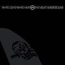 The album cover; a faint image of a skull tattoo. It is difficult to distinguish the tattoo, as the image is black, printed on a slightly lighter black background. On this cover, the album name, Verve logo, and band name are all on one line.