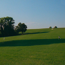 Cover art for the acoustic version: SZA and a man running towards each other in a large grassland