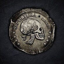 The obverse side of an ancient-looking tarnished silverish coin featuring a side-view portrait of the head and neck a skeleton looking to the right and wearing a laurel wreath. The visual portion of the skull's neurocranium features a simple map of the Western hemisphere. The emblem of the coin, which wraps most of the way around the coin, has, in order, four stars, SEPULTURA, QUADRA, and then four more stars. A hole appears between SEPULTURA and QUADRA. Below the portrait is the year 2020. The coin appears against a rough dark gray sooty-looking background.