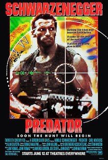 A muscular soldier holds an M16 machine gun. The foreground has the crosshair of a gun's sight centered on the man's heart. The background is in the style of a brightly colored thermal map. The name Schwarzenegger is in large red letters at the top of the poster and the film title is in the same size and below the picture.