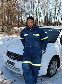 Dr. Mohamed H. Elsanabary is photographed standing in front of a NISSAN car at the Paddle River basin, Alberta, January 12, 2008.