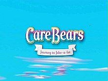 The film's title logo appears against a blue sky with some white clouds. The words "Care Bears" are stacked above the subtitle, "Journey to Joke-a-lot".