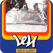 A picture of three women wearing sunglasses sitting in a convertible and and looking straight at the camera. A layered red, yellow, and blue border surrounds the picture with the group name, Len, and title, "Feelin' Alright", standing below the picture.